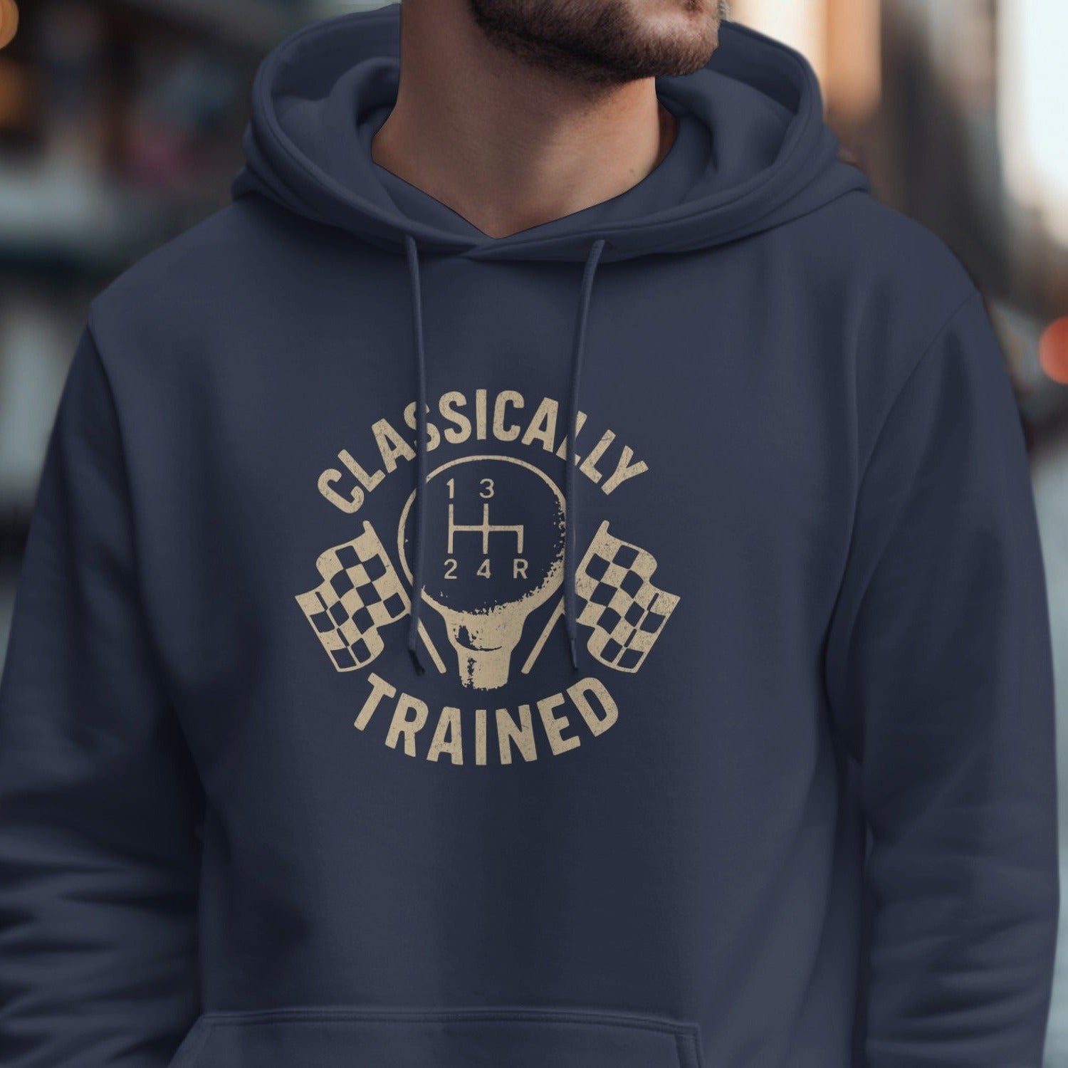 Navy hoodie with "Classically Trained" text and gear shift graphic.
