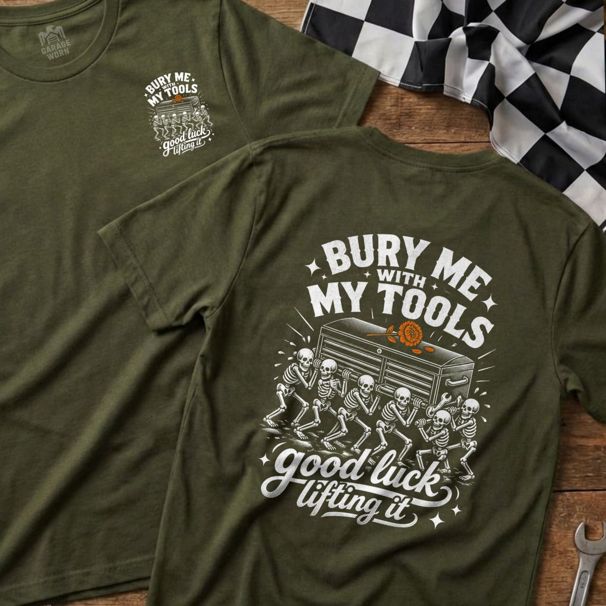 Green t-shirt with skeleton graphic and text "Bury me with my tools good luck lifting it."
