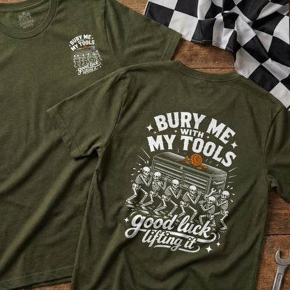 Green t-shirt with skeleton graphic and text "Bury me with my tools good luck lifting it."
