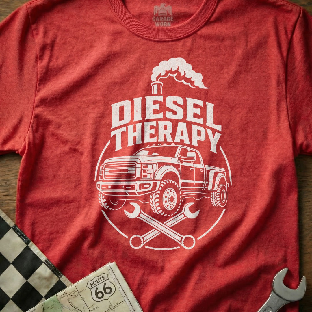 Red t-shirt with white "DIESEL THERAPY" text, truck, and crossed wrenches graphic.