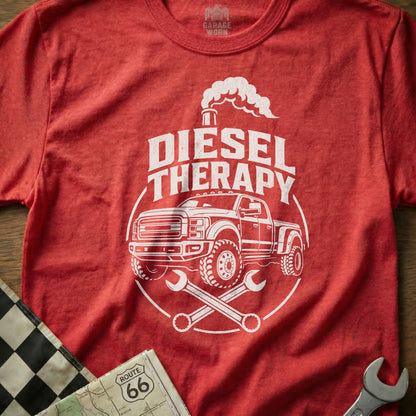 Red t-shirt with white "DIESEL THERAPY" text, truck, and crossed wrenches graphic.
