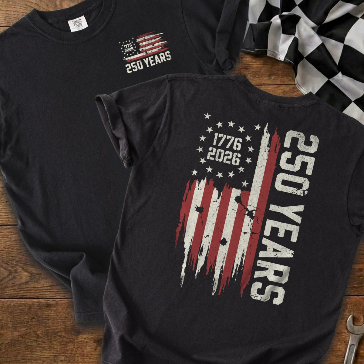 Dark t-shirts with distressed American flag graphic celebrating 250 years.