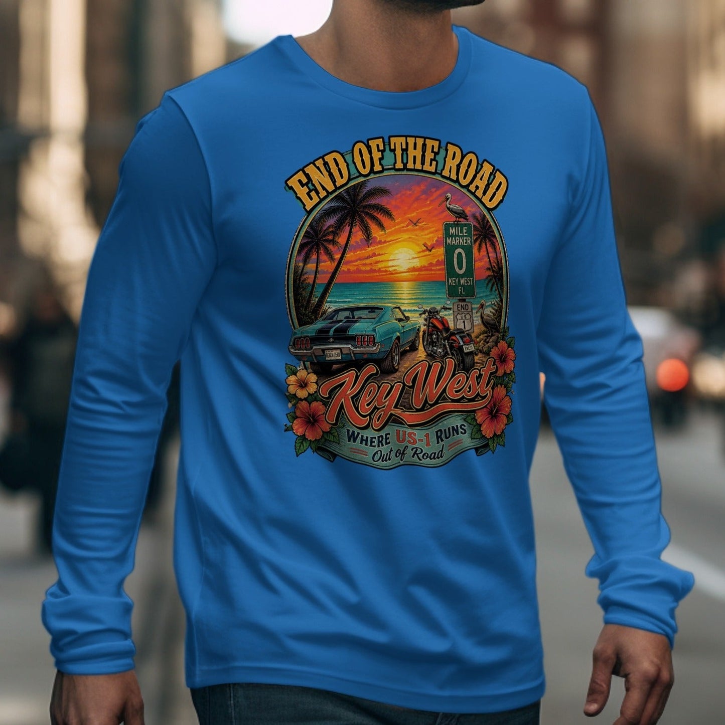 Blue long-sleeve shirt with Key West "End of the Road" graphic: car, motorcycle, sunset.