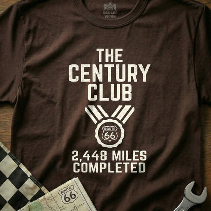 Brown t-shirt with "The Century Club Route 66 2,448 Miles Completed" text.