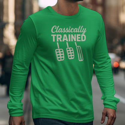 Green long sleeve shirt with "Classically TRAINED" and clutch, brake, and gas pedals.
