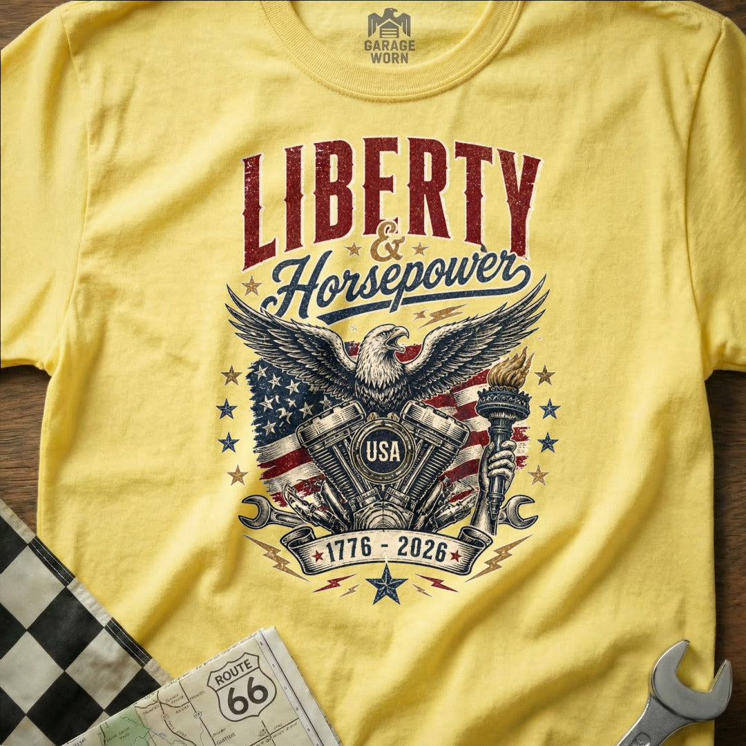 Yellow t-shirt with "Liberty & Horsepower" text, eagle, motorcycle engine, and USA flag.