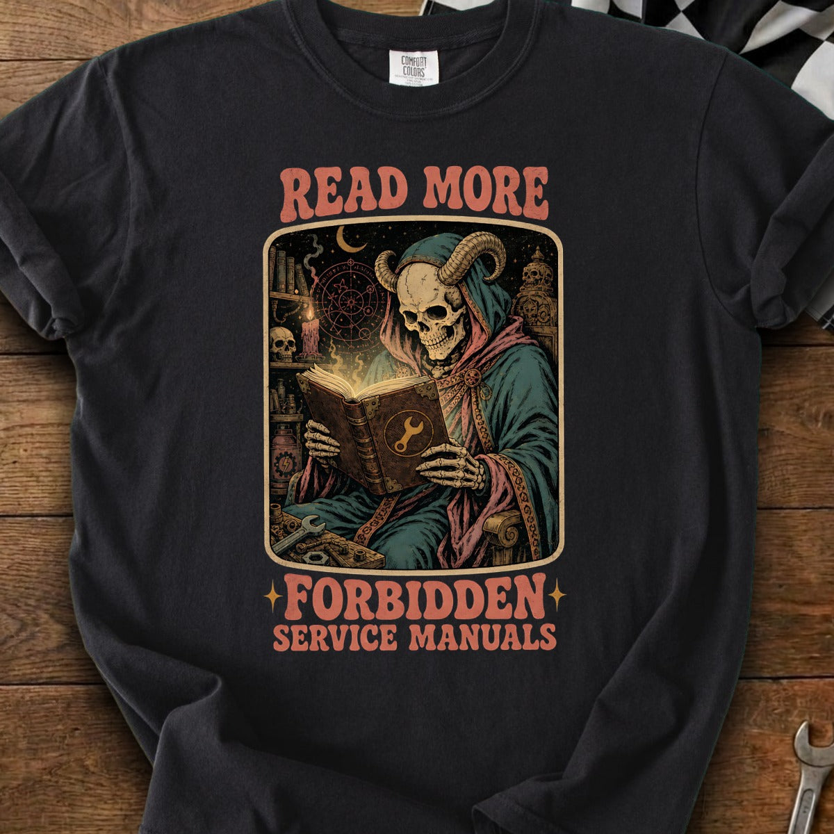 Grim reaper skeleton reading a book with "READ MORE FORBIDDEN SERVICE MANUALS" text.