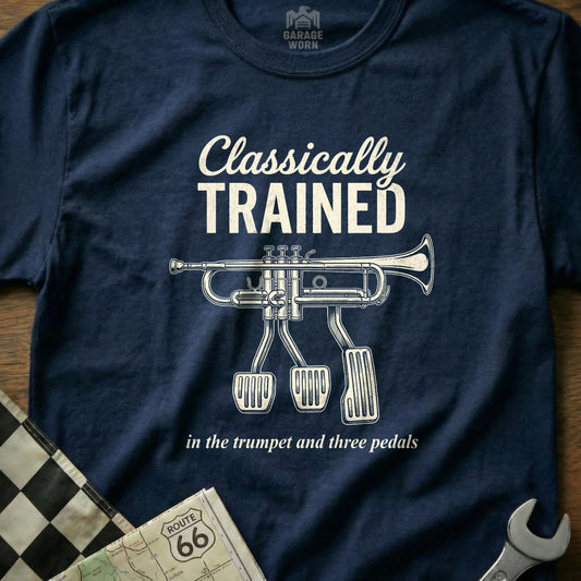Navy t-shirt with trumpet and three pedals graphic; text "Classically Trained".