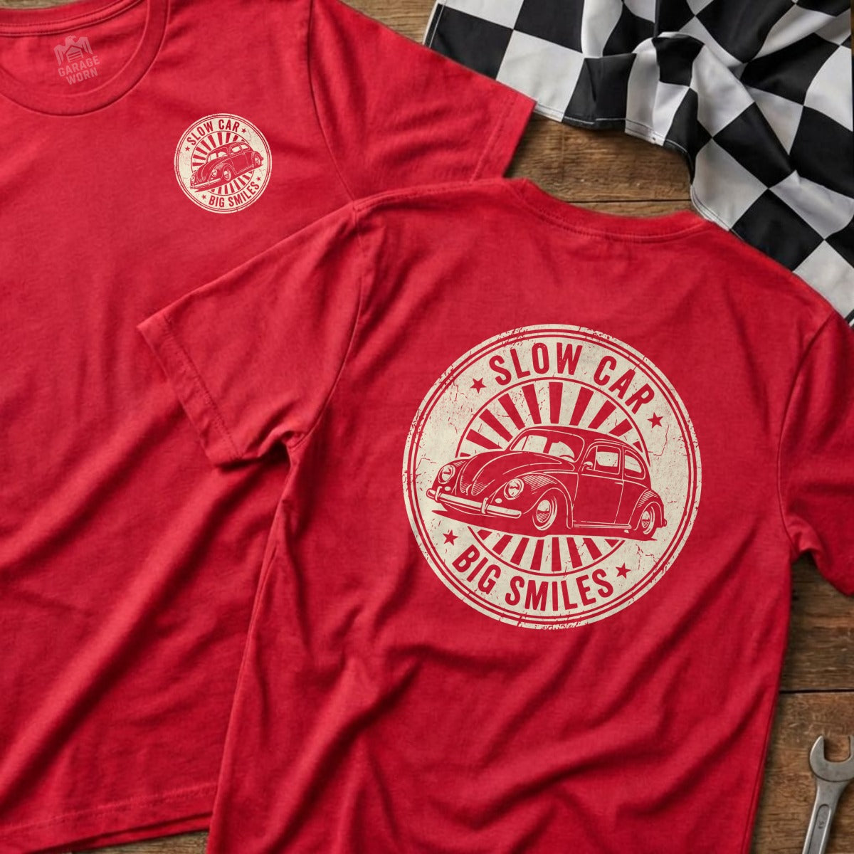 Red t-shirt with vintage car graphic and "Slow Car, Big Smiles" text.