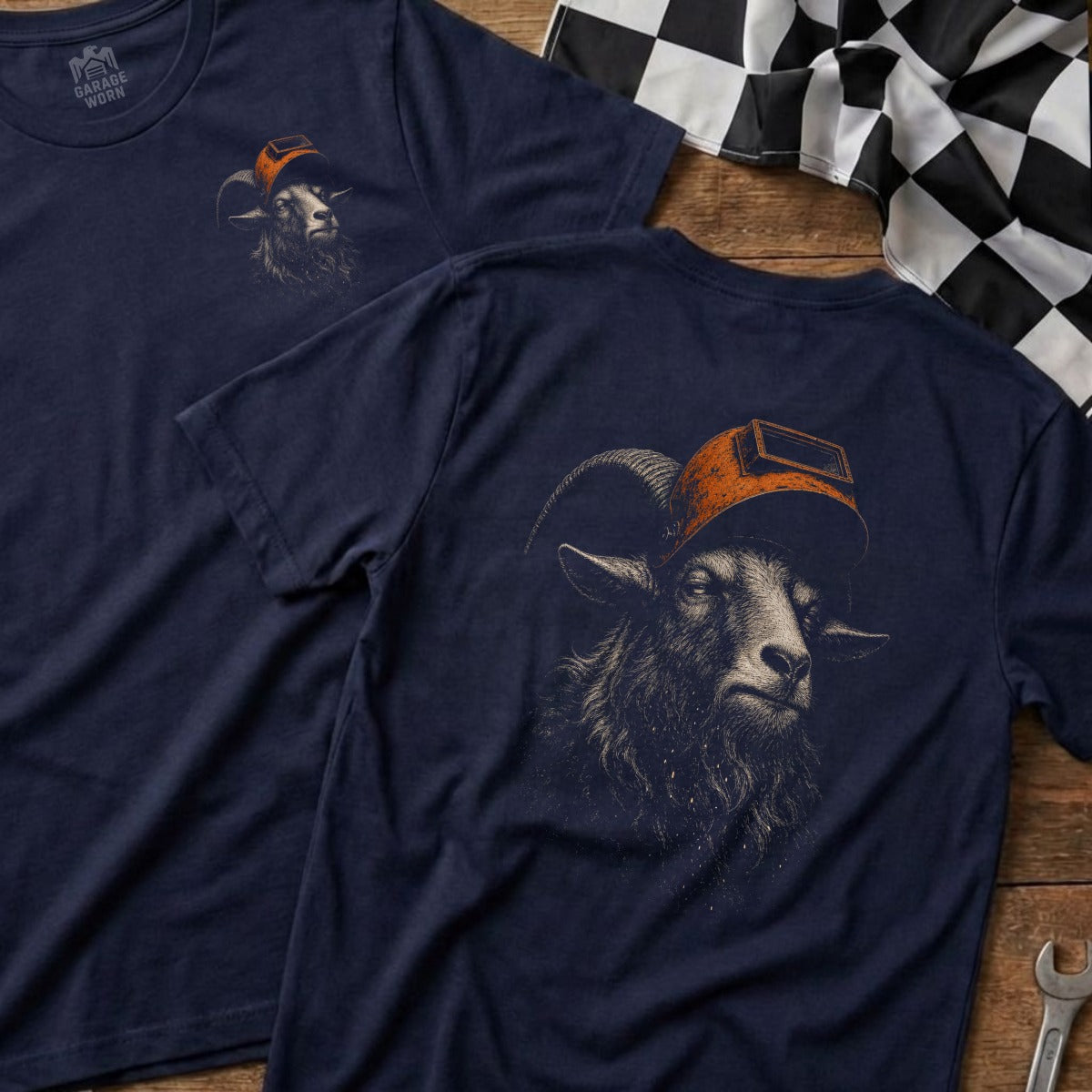 Navy t-shirt with graphic of a goat wearing a welding mask.