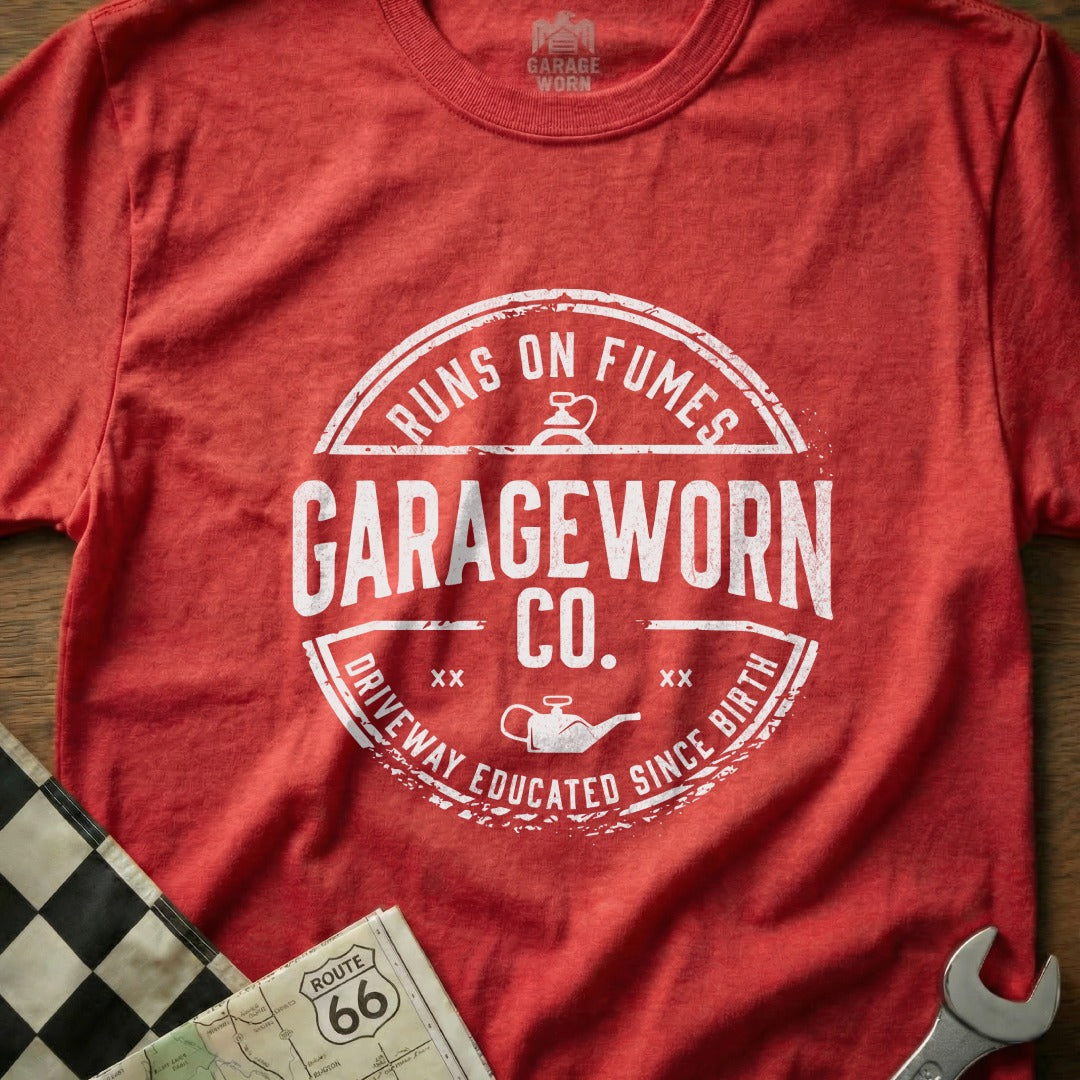 Red t-shirt with "GARAGEWORN CO. RUNS ON FUMES DRIVEWAY EDUCATED SINCE BIRTH" text.
