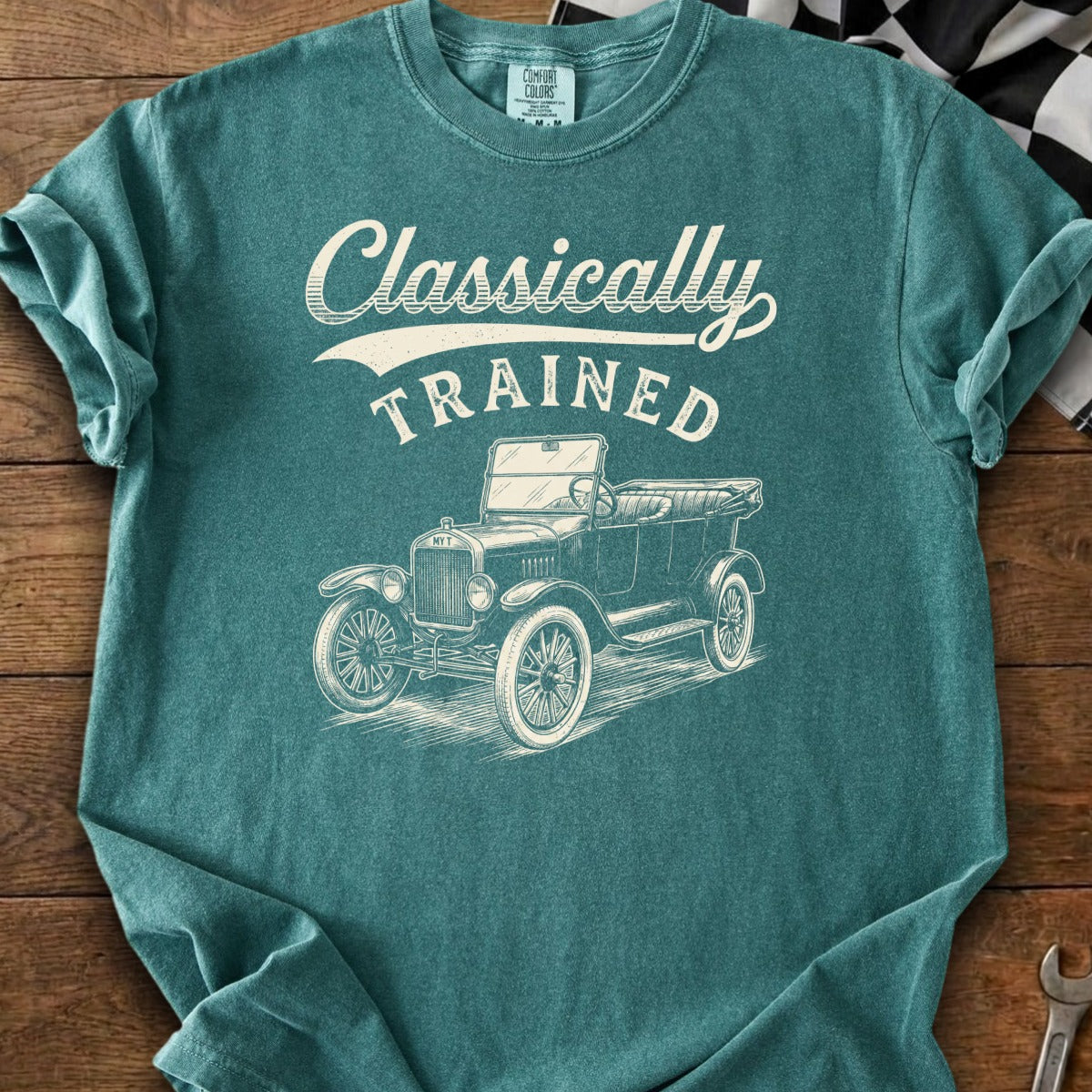 Teal t-shirt with "Classically TRAINED" text and vintage car graphic.