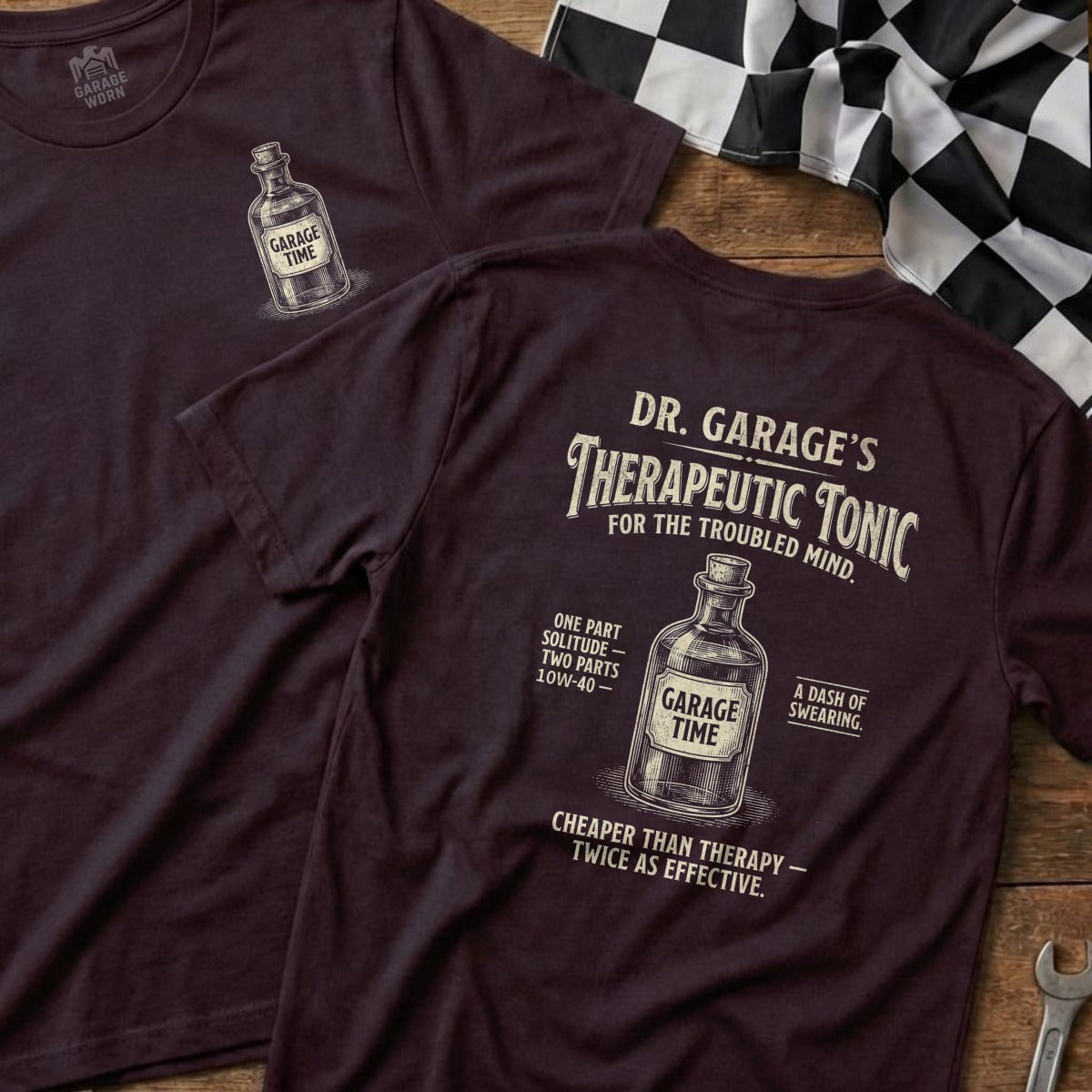 Burgundy t-shirt with "Dr. Garage's Therapeutic Tonic" bottle design.