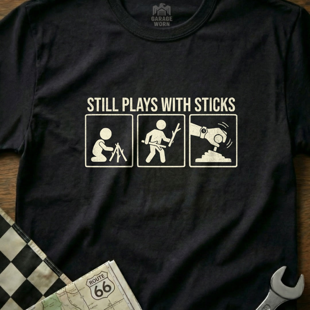 T-shirt with three icons: person camping, person with stick, and hand holding a gear shift.