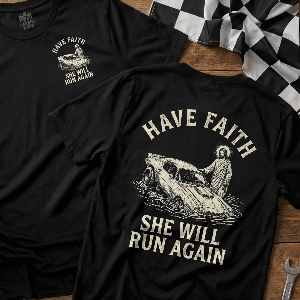 Black t-shirt with Jesus in a car surrounded by water.