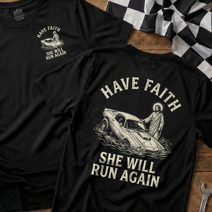 Black t-shirt with Jesus in a car surrounded by water.
