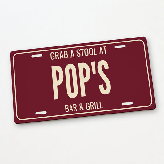 Grab A Stool At Pop's Personalized License Plate - 12 x 6 in aluminum license plate