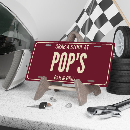 Grab A Stool At Pop's Personalized License Plate - 12 x 6 in aluminum license plate