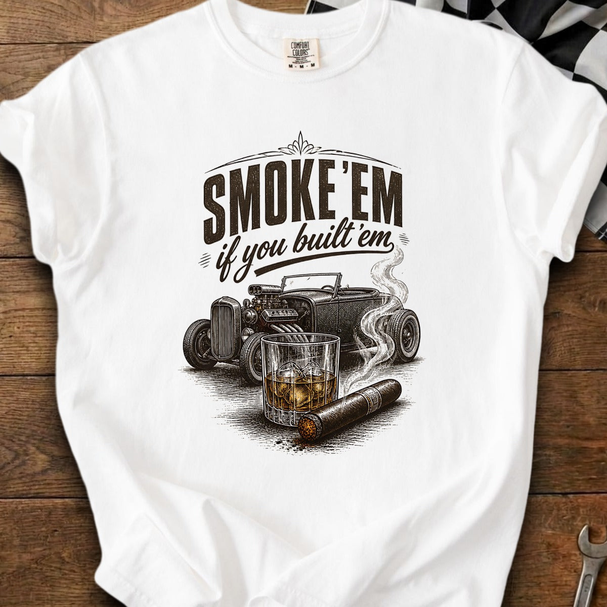 White t-shirt with "Smoke 'em if you built 'em" text and hot rod graphic.