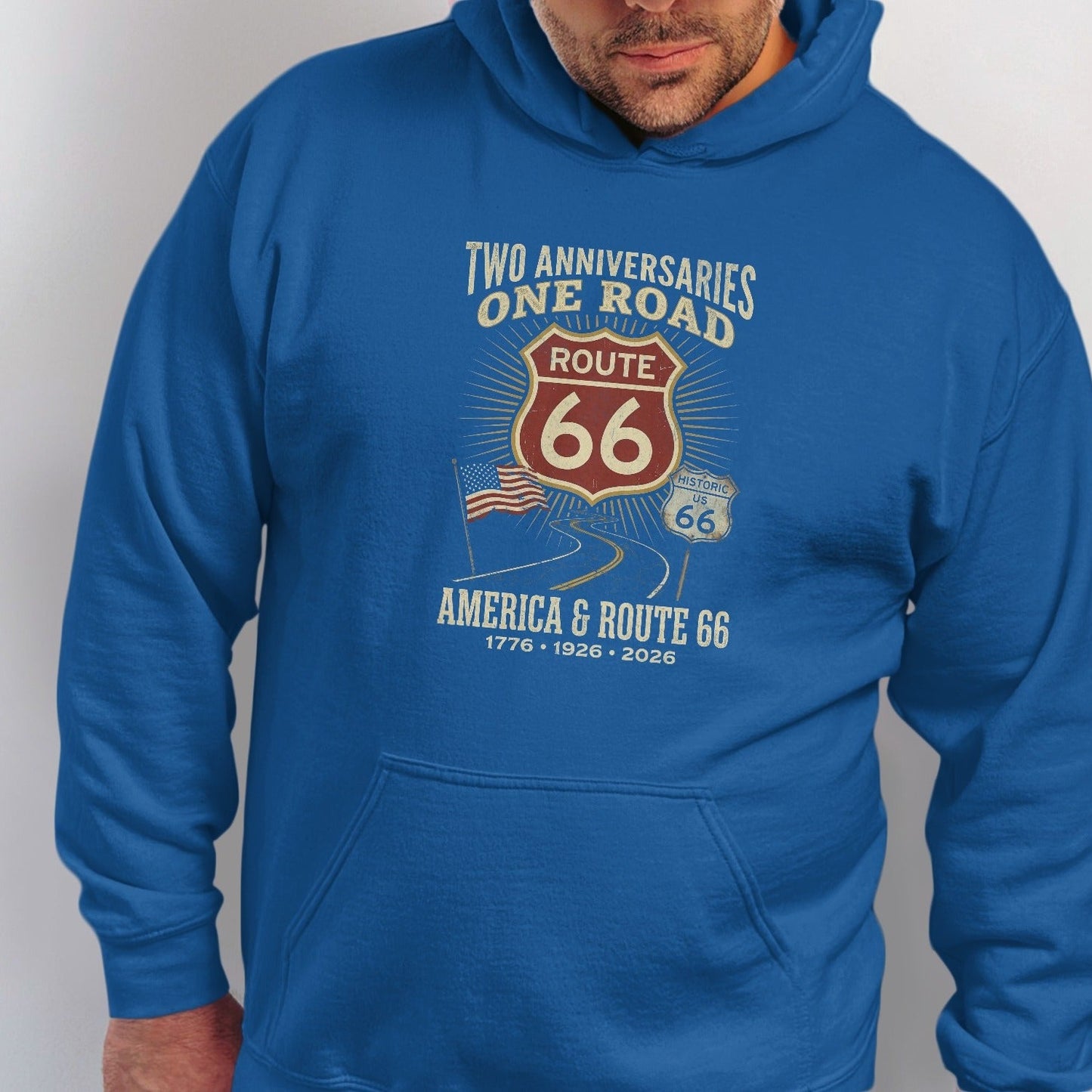 Blue hoodie with "Two Anniversaries. One Road. Route 66" graphic.