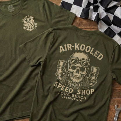 Green t-shirt with vintage "Air-Cooled Speed Shop" skull graphic.