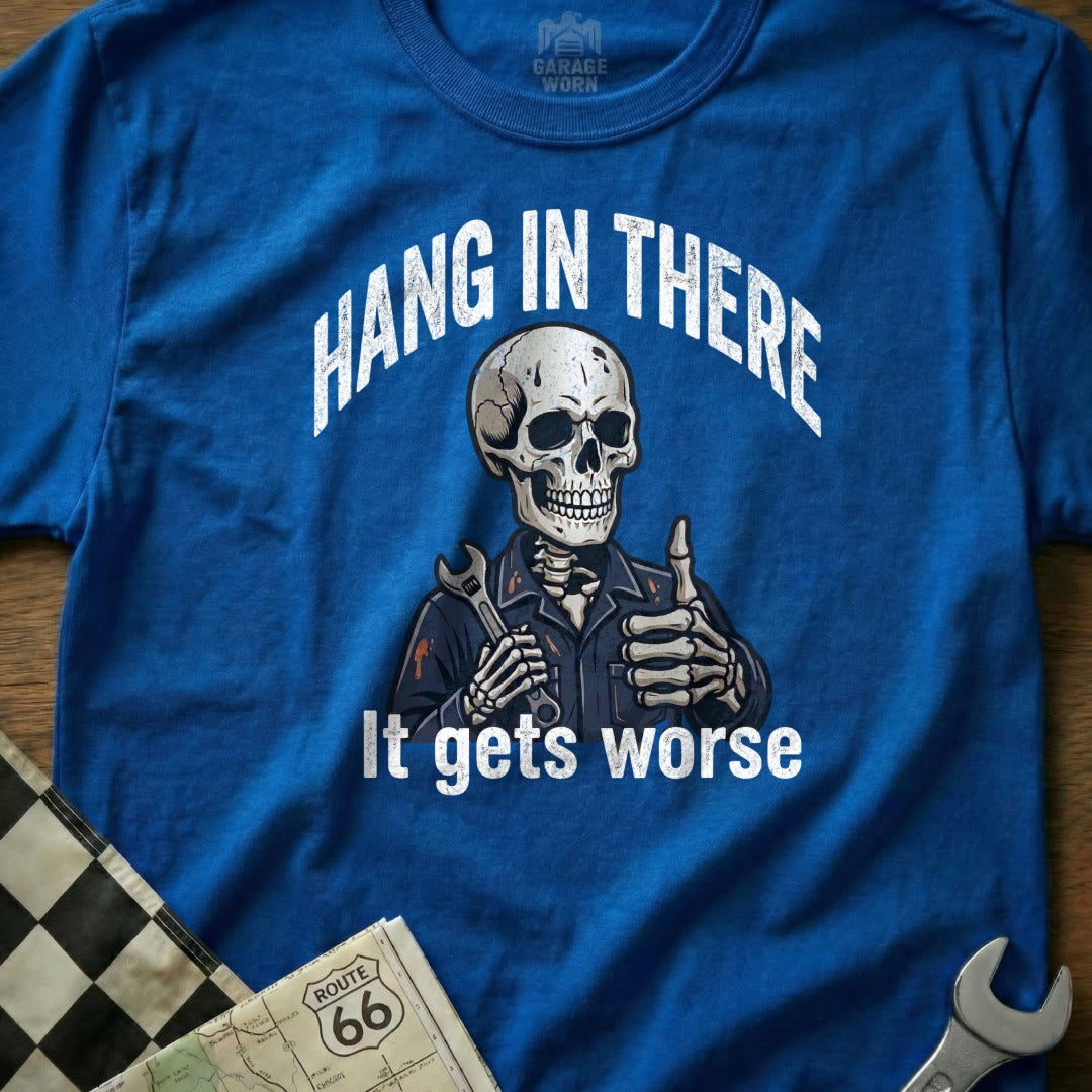 T-shirt with skeleton giving thumbs up, holding wrench, text "Hang in there, it gets worse".