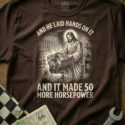 Jesus working on an engine, text says "And he laid hands on it and it made 50 more horsepower."