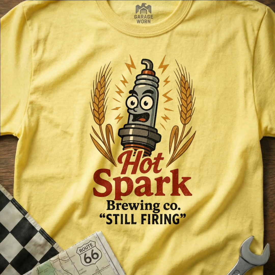 Yellow t-shirt with "Hot Spark Brewing Co." logo and a cartoon spark plug.