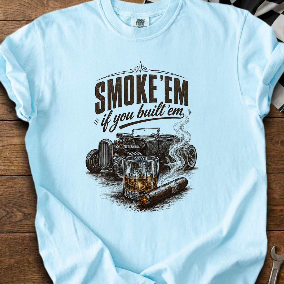 Light blue t-shirt with "SMOKE 'EM if you built 'em" and hot rod graphic.