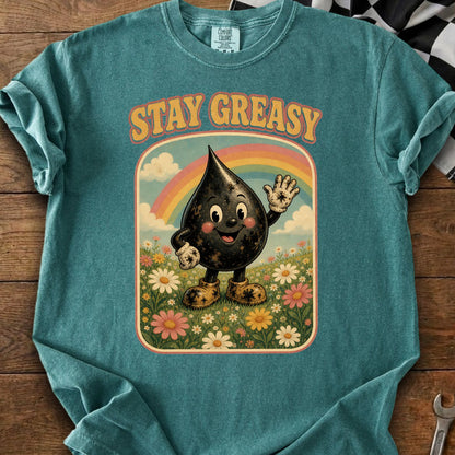 Teal t-shirt with cartoon oil drop character and "STAY GREASY" text.