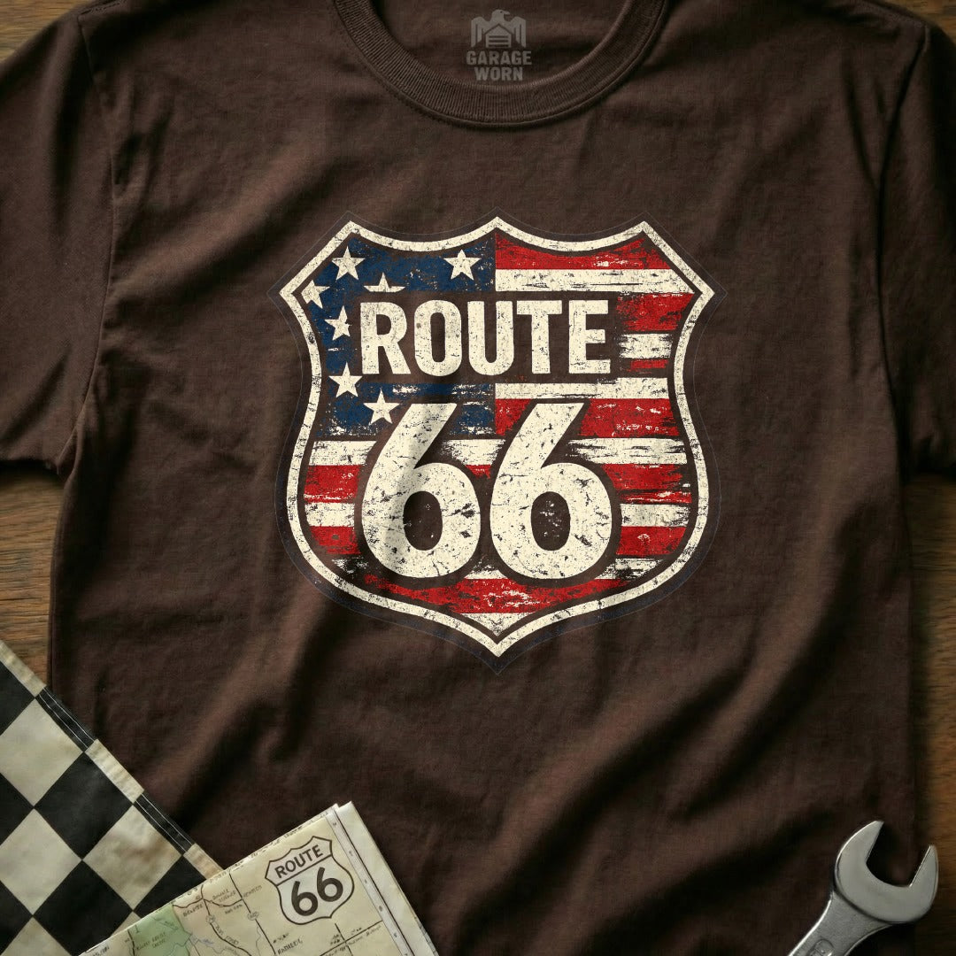 Brown t-shirt with distressed Route 66 shield logo featuring American flag design.