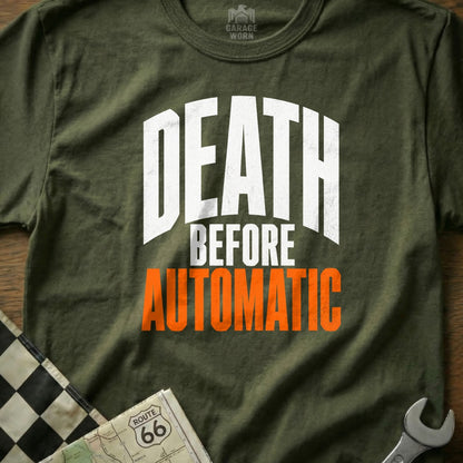 Olive green t-shirt with white and orange text: "DEATH BEFORE AUTOMATIC".