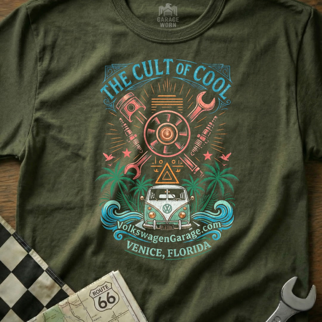 "The Cult of Cool" t-shirt features a VW van, tools, and palm trees.