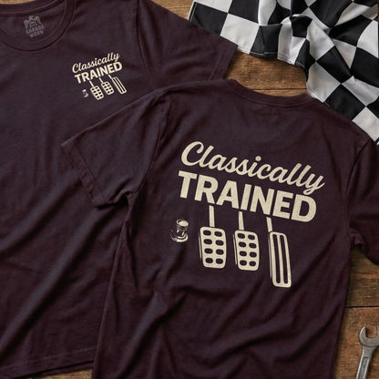 Burgundy t-shirt with "Classically TRAINED" text and pedal graphic.