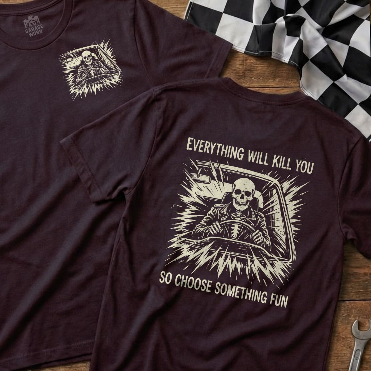 Dark t-shirt with skeleton driving, text reads "Everything will kill you so choose something fun".