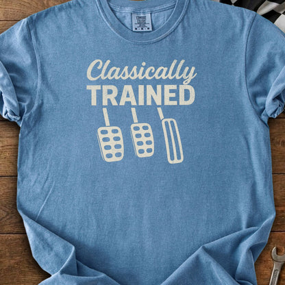 Blue t-shirt with "Classically TRAINED" text and three pedal graphics.