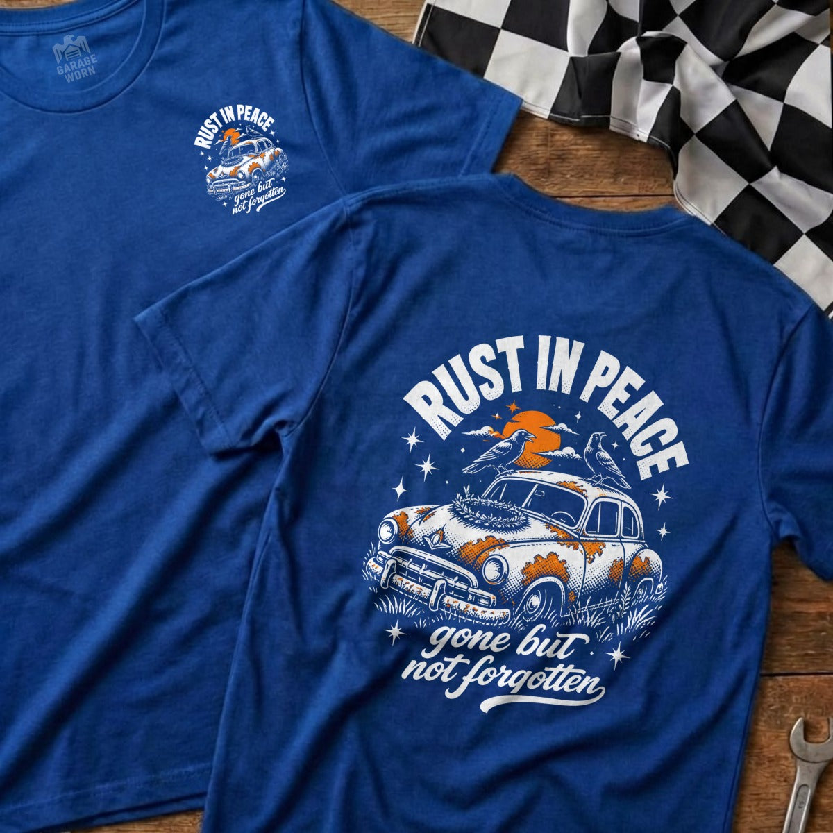 Blue t-shirt with "RUST IN PEACE gone but not forgotten" graphic on back.
