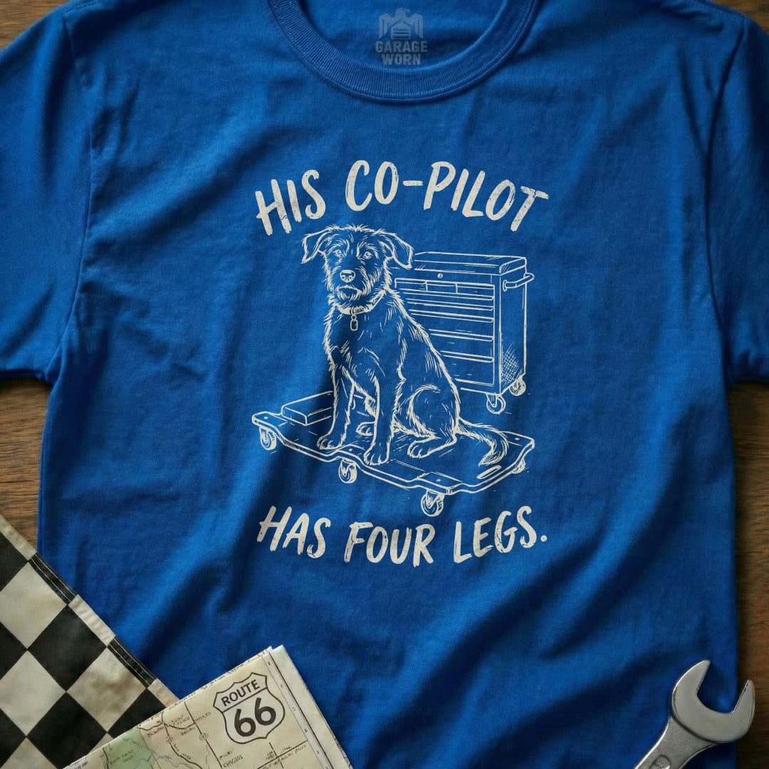 Blue t-shirt with "His Co-Pilot Has Four Legs" and dog drawing.