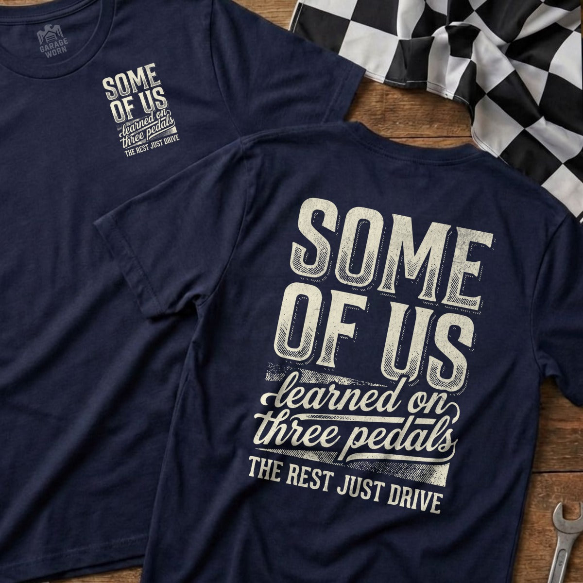 T-shirts with "Some of us learned on three pedals" graphic.