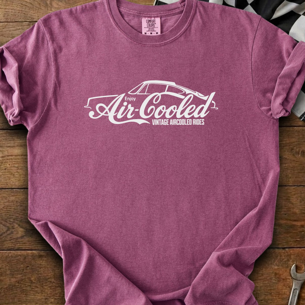 Purplish t-shirt with white "Enjoy Air-Cooled Vintage Aircooled Rides" text and car outline graphic.
