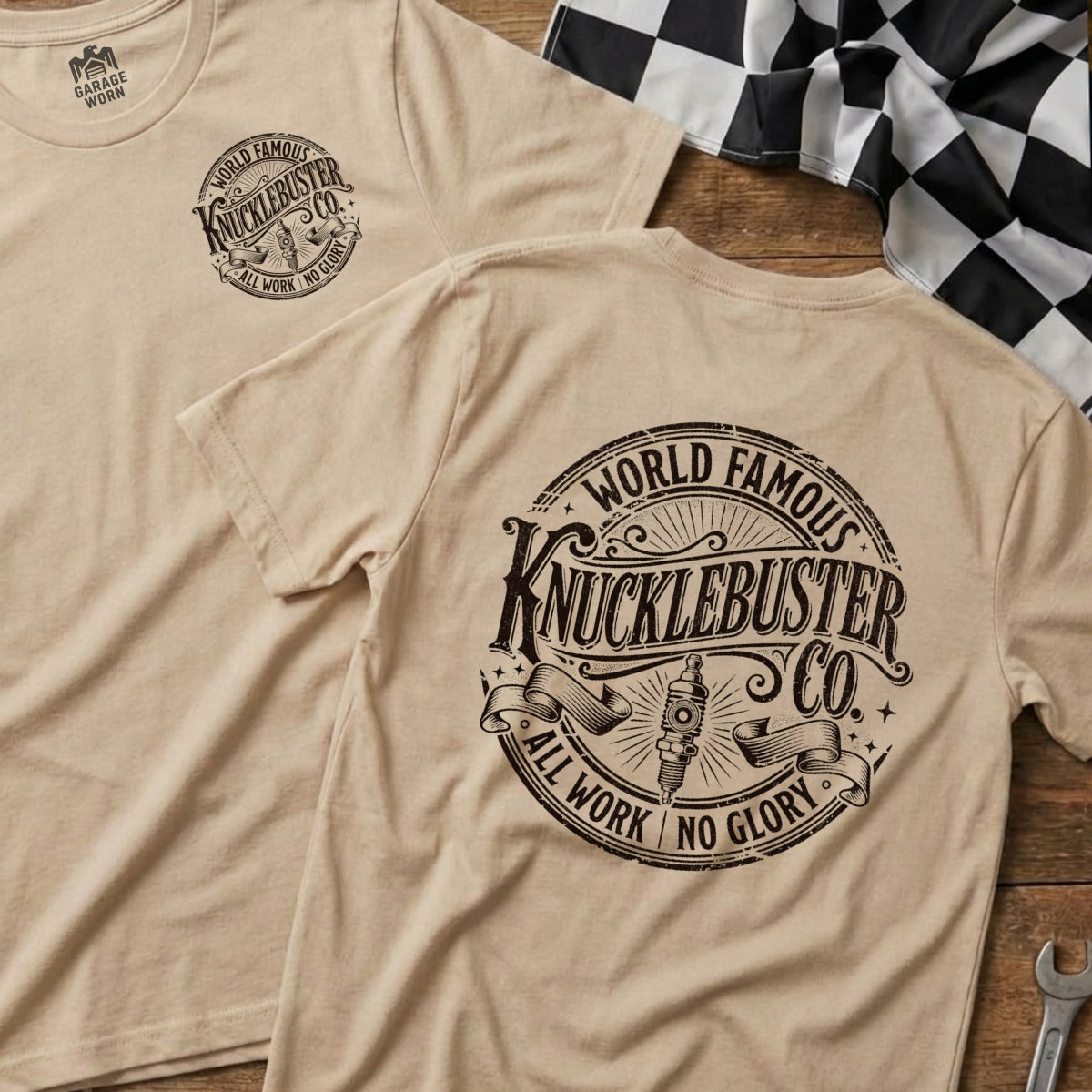 Two tan t-shirts, one with "Garage Worn" logo, both with "Knucklebuster Co." logo.