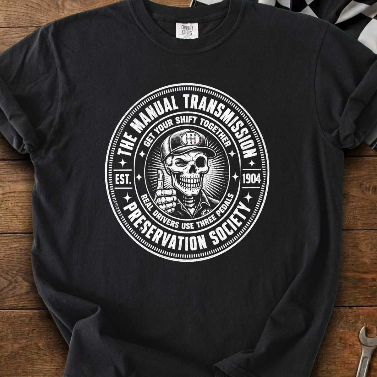 Black t-shirt with graphic for "The Manual Transmission Preservation Society."