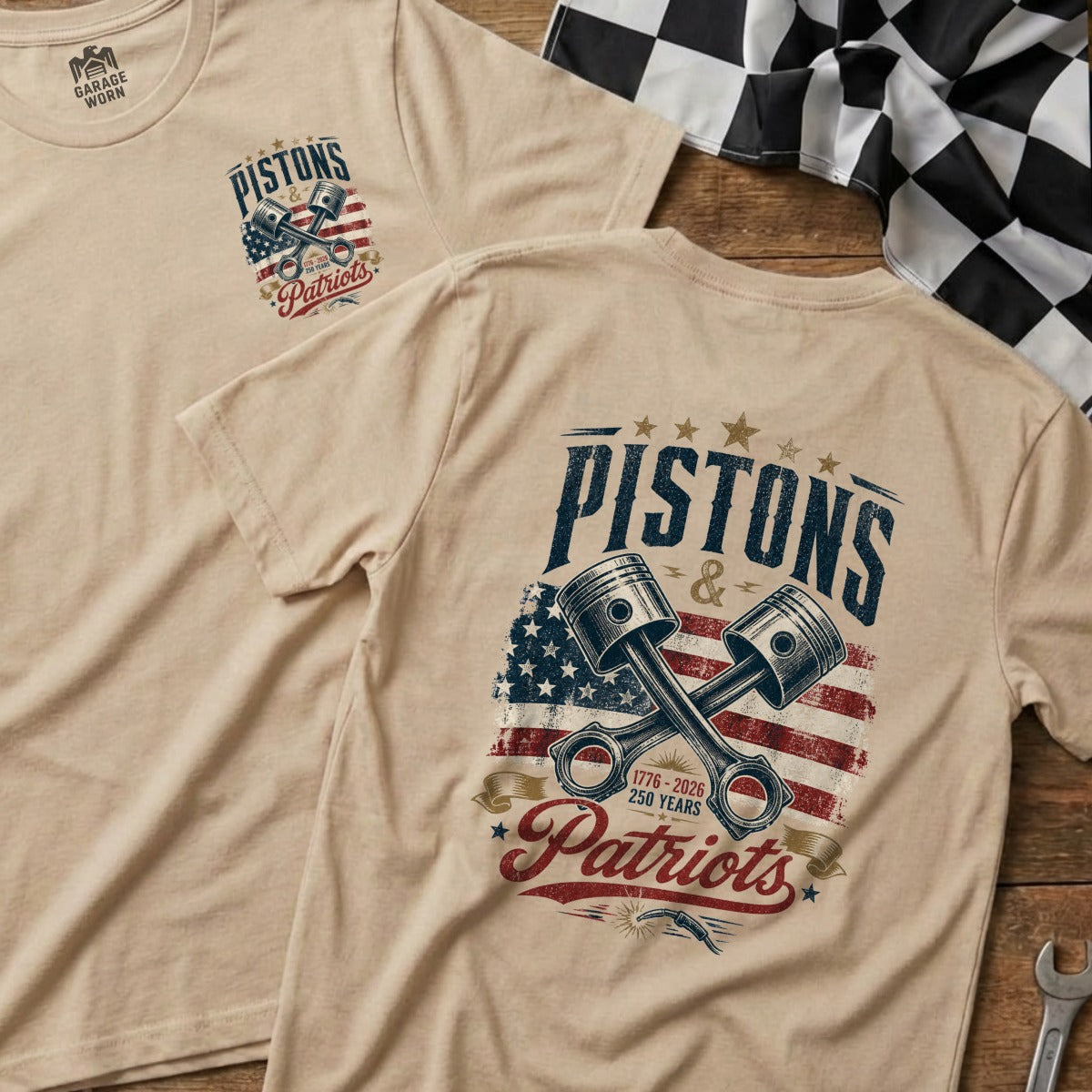 T-shirt with "Pistons & Patriots" graphic and crossed pistons over US flag.