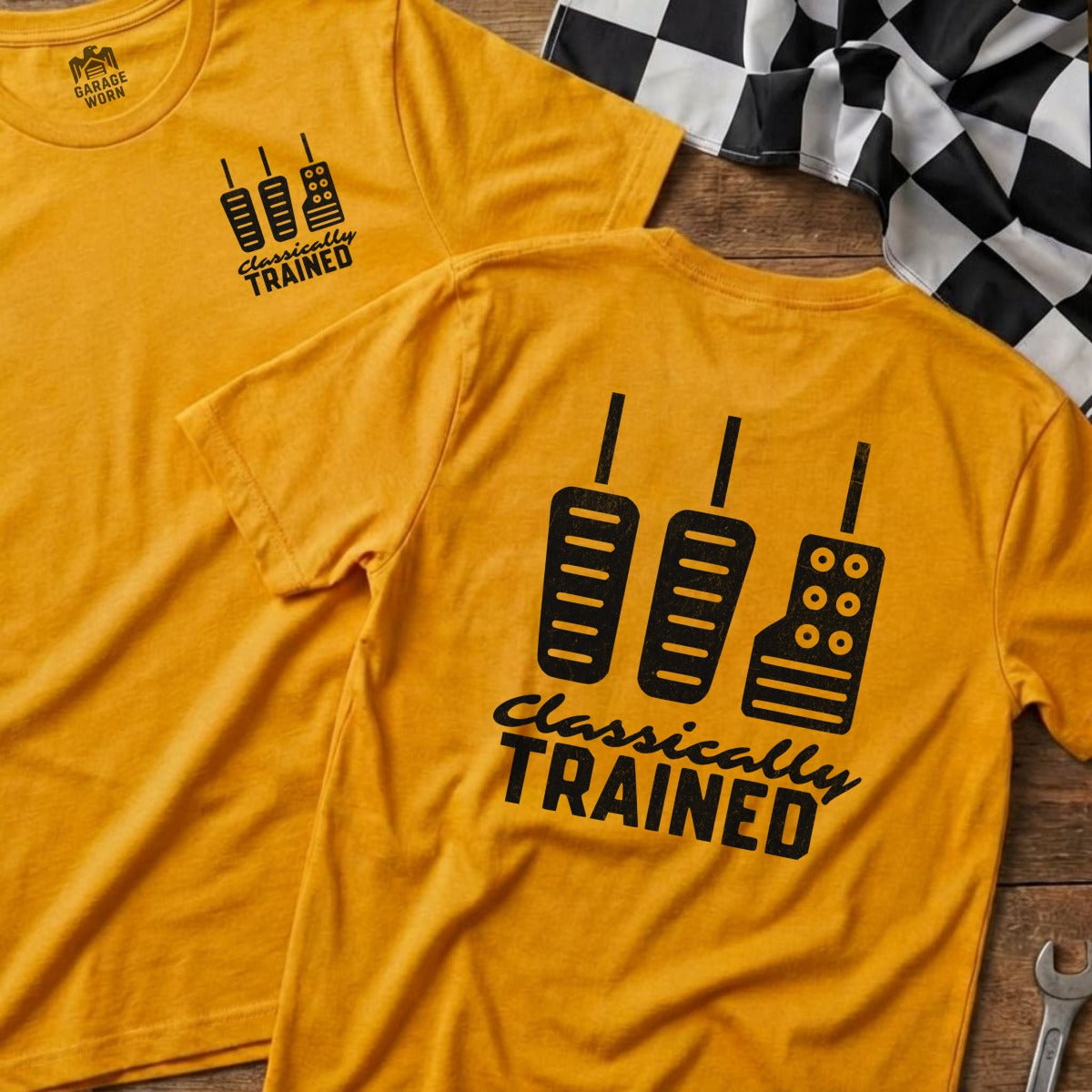 Yellow t-shirt with pedals and "Classically Trained" text.