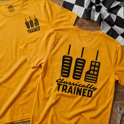 Yellow t-shirt with pedals and "Classically Trained" text.
