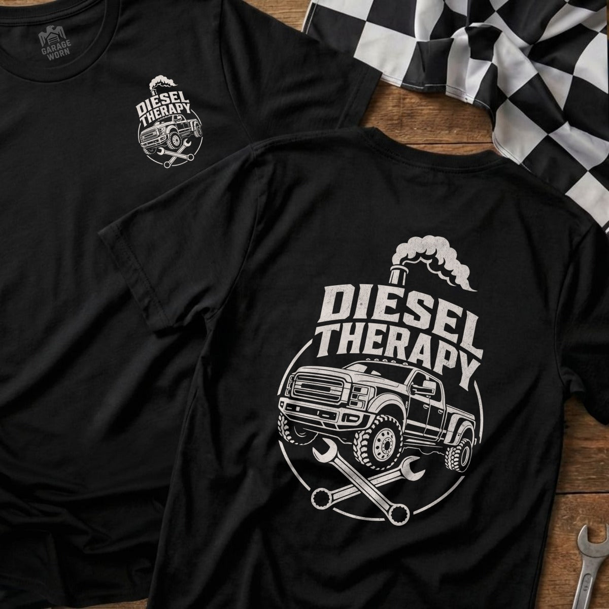 Black tee with white "Diesel Therapy" graphic featuring a truck, wrenches, and smoke.