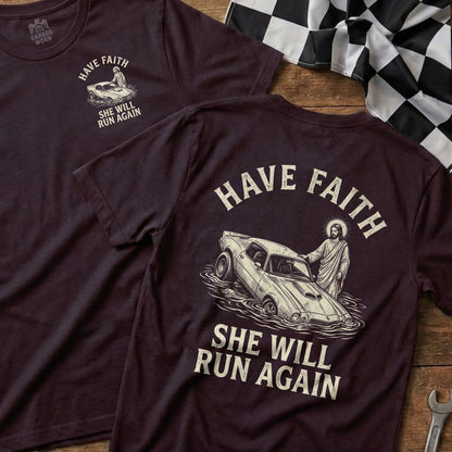 Maroon t-shirt with Jesus helping a classic car, reading "Have Faith She Will Run Again."