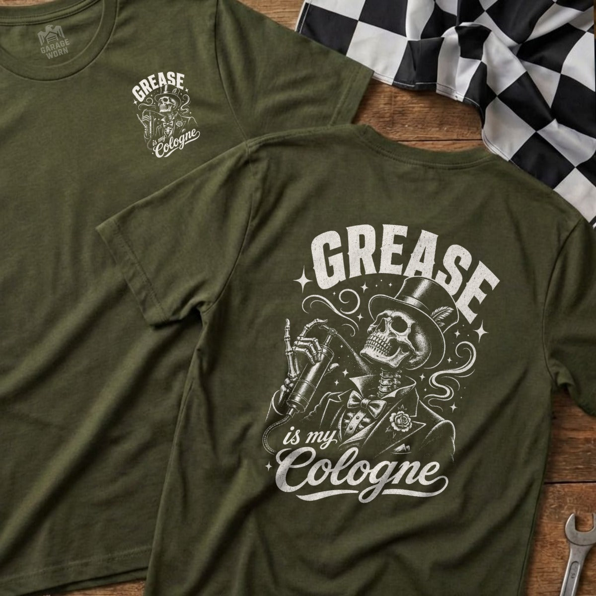 Olive green t-shirt with skeleton wearing a top hat, suit, and spraying cologne.