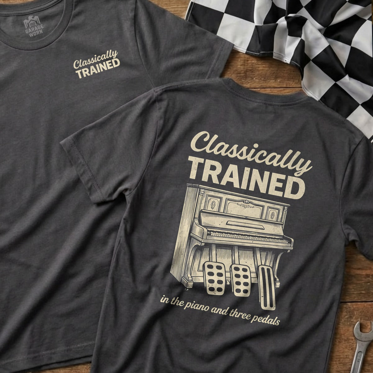 Dark grey t-shirt with "Classically Trained" and a piano on the back.