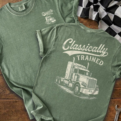 Green t-shirt with white graphic of a truck and "Classically TRAINED" text.